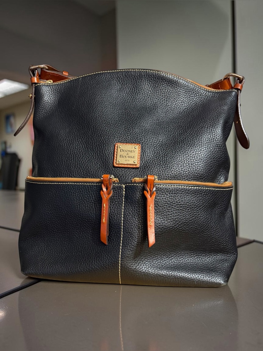 Dooney & Bourke Black Pebbled Leather Tote with Cognac Trim